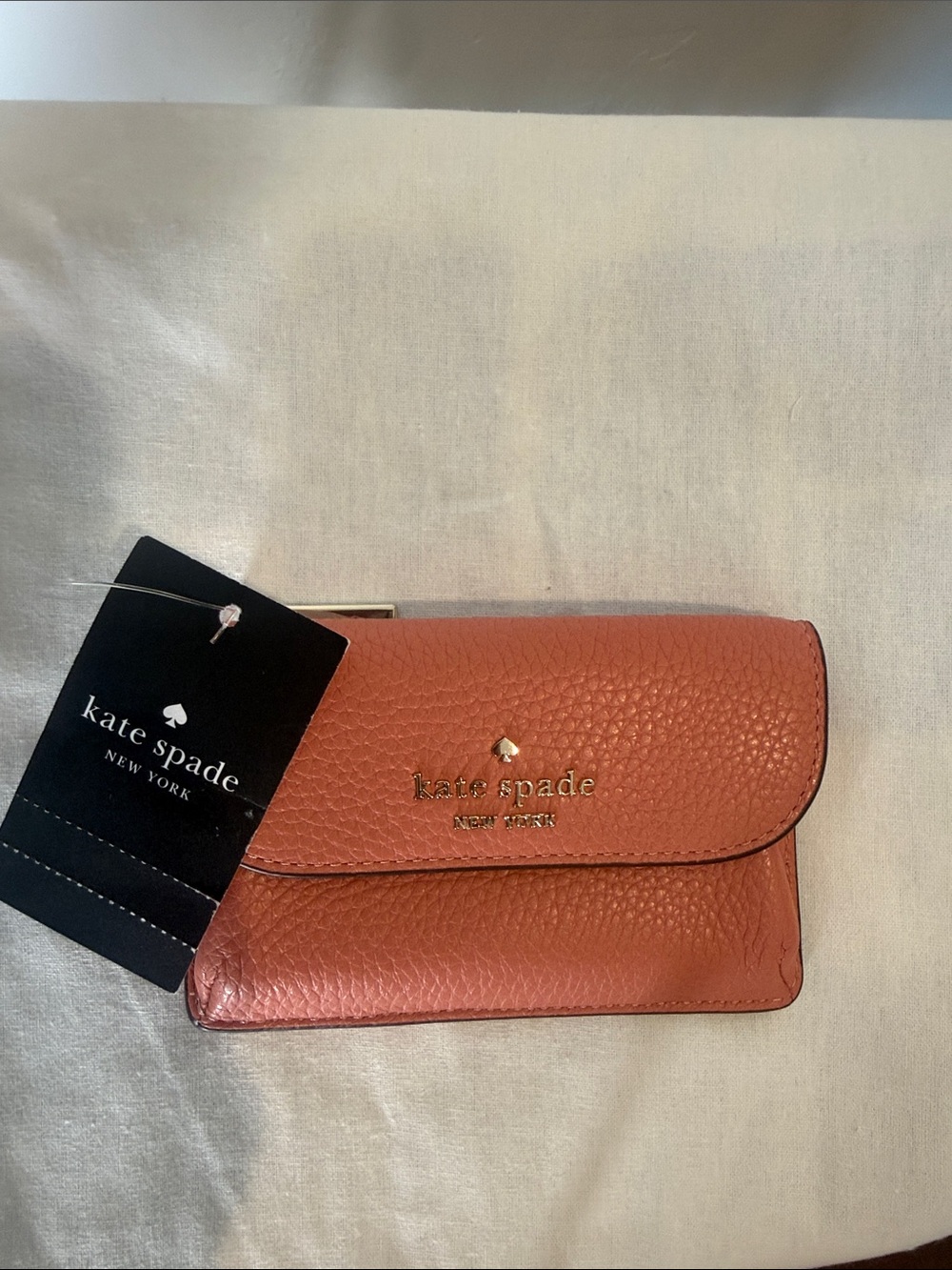 kate spade Terracotta Pebbled Leather Flap Wallet with Gold Logo